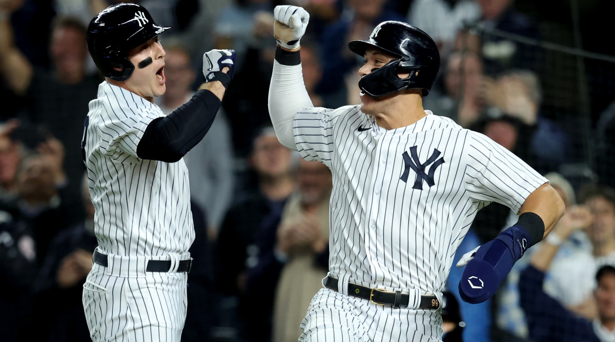 Yankees first baseman Anthony Rizzo and right fielder Aaron Judge celebrate after Rizzo hit a home run.