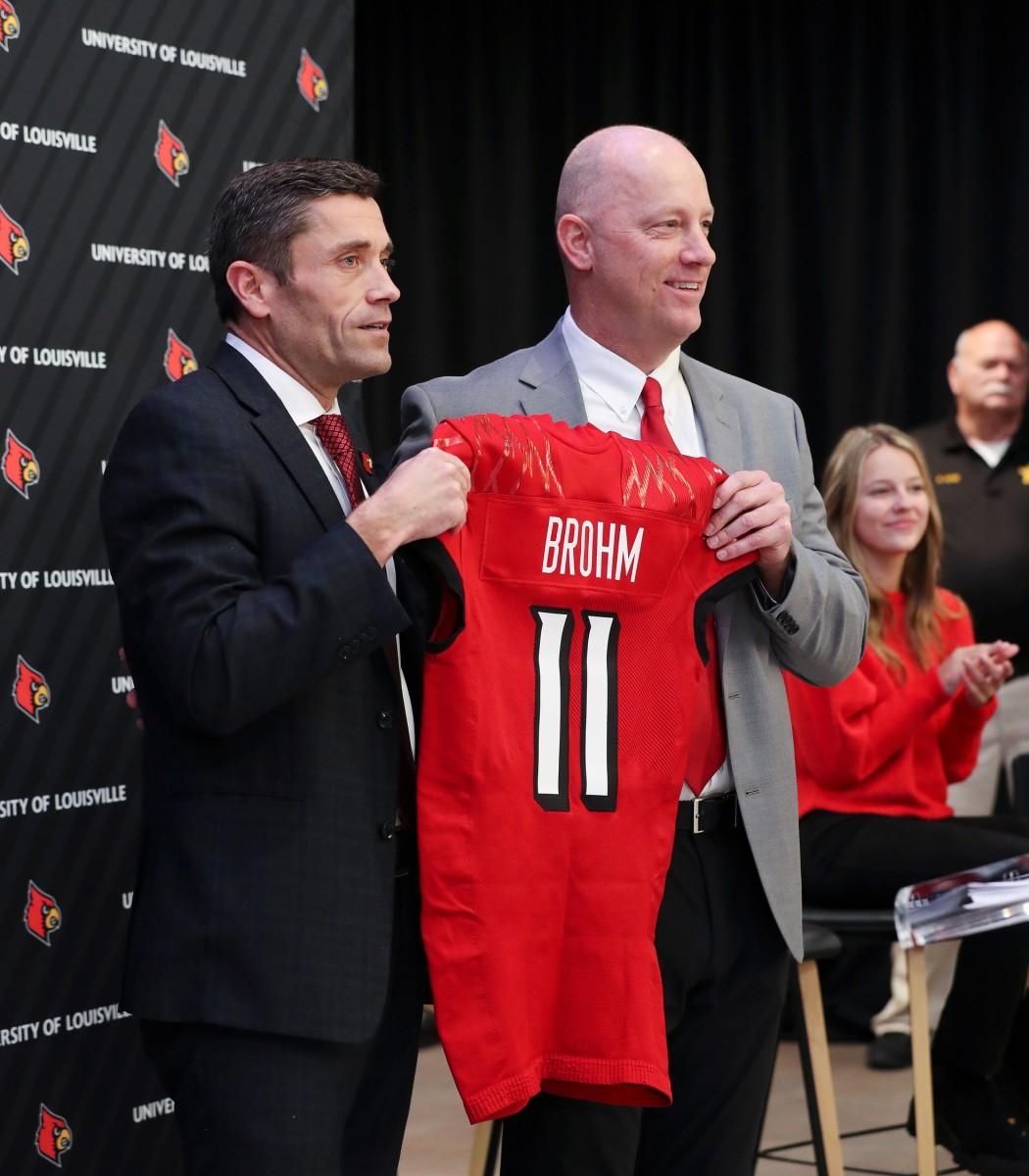 U of L Athletic Director Josh Heird, coach Jeff Brohm, Louisville Cardinals football