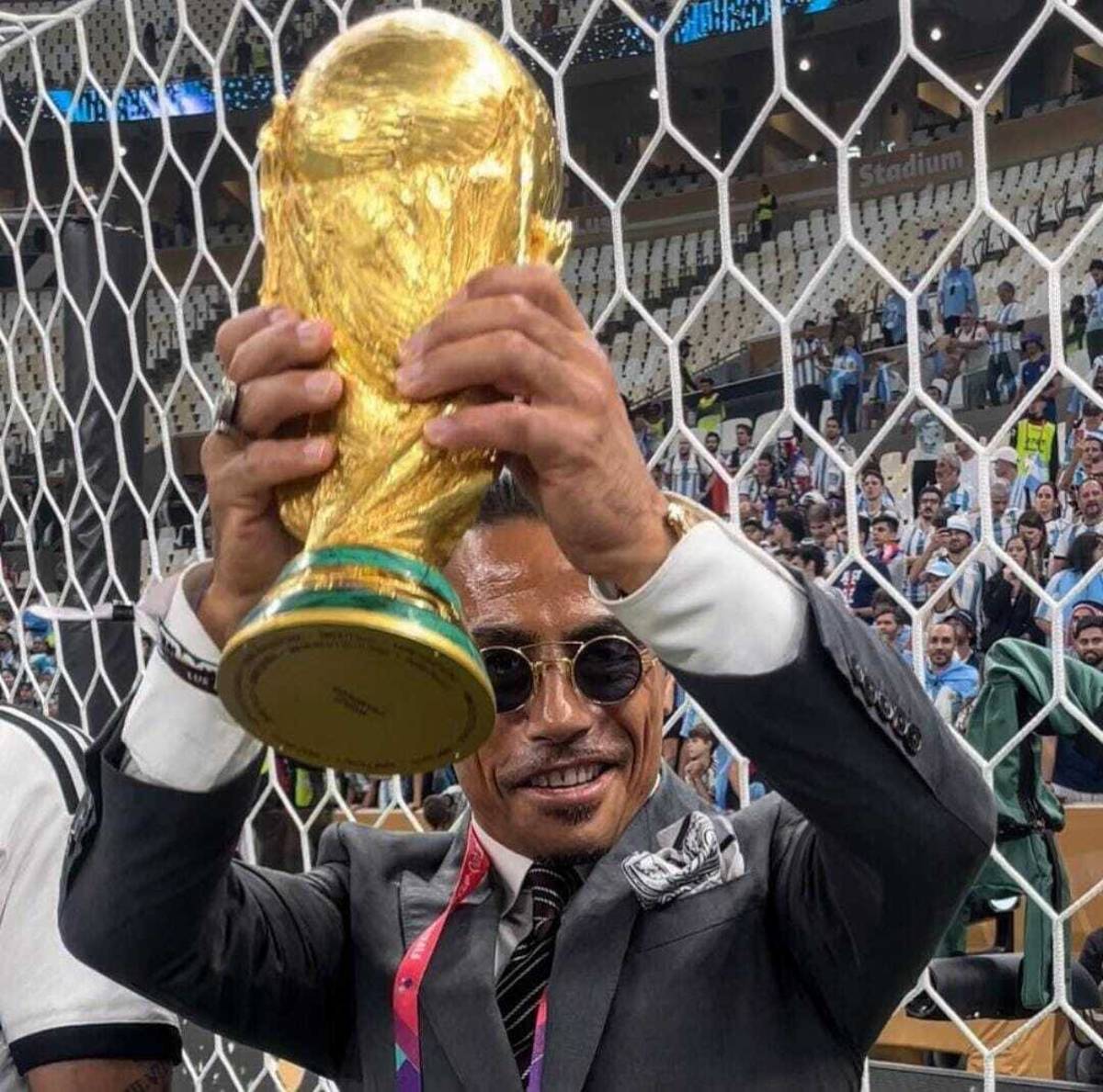 Salt Bae, aka Nusret Gokce, pictured holding the World Cup trophy after invading the pitch at Lusail Stadium following the 2022 final