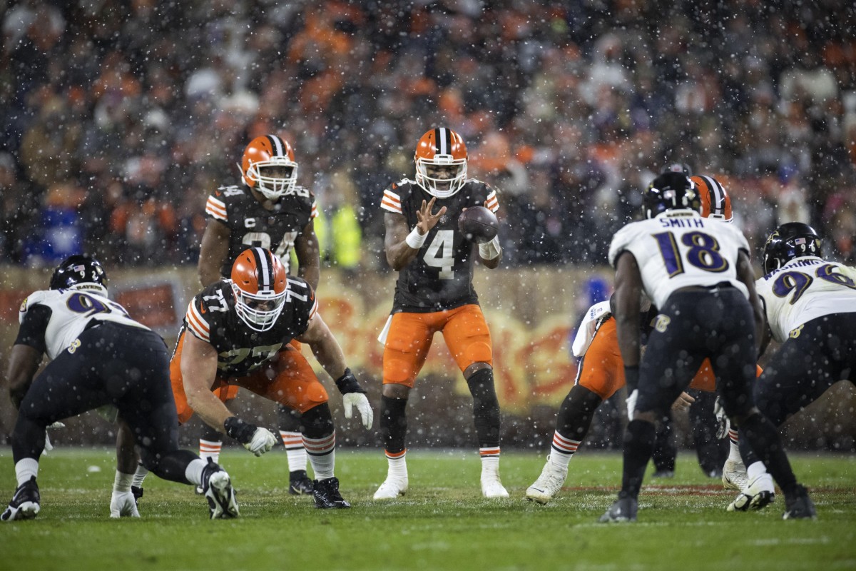 Cleveland Browns quarterback Deshaun Watson (4) takes a snap against the Baltimore Ravens. Mandatory Credit: Scott Galvin-USA TODAY Sports