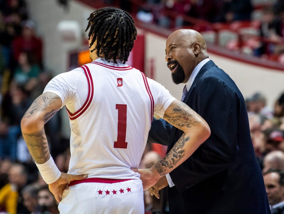 Indiana guard Jalen Hood-Schifino listens to coach Mike Woodson on the sidelines (USA TODAY Sports)