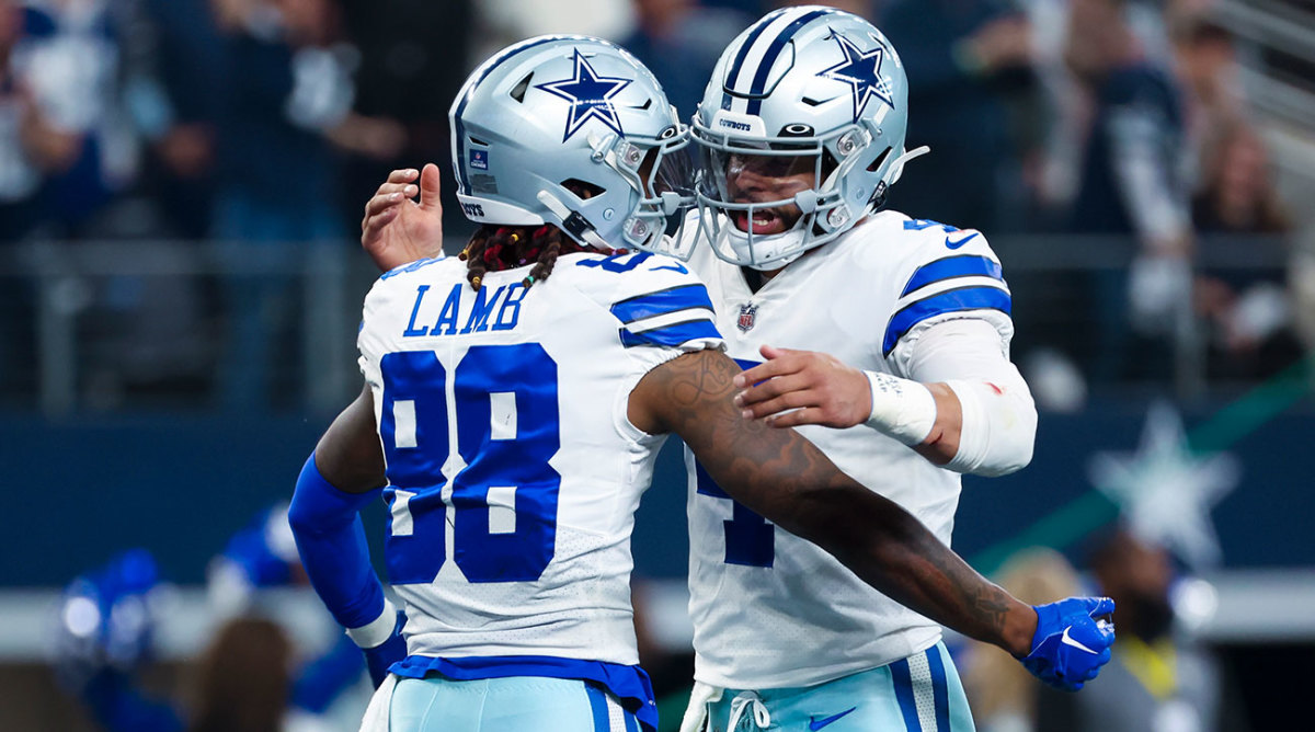 CeeDee Lamb and Dak Prescott celebrate a touchdown against the Eagles