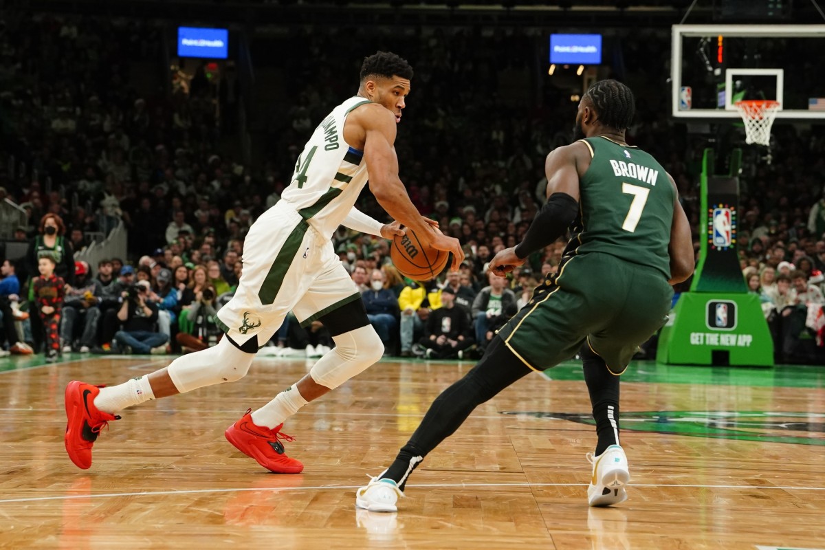 Milwaukee Bucks power forward Giannis Antetokounmpo (34) drives the ball against Boston Celtics shooting guard Jaylen Brown (7)