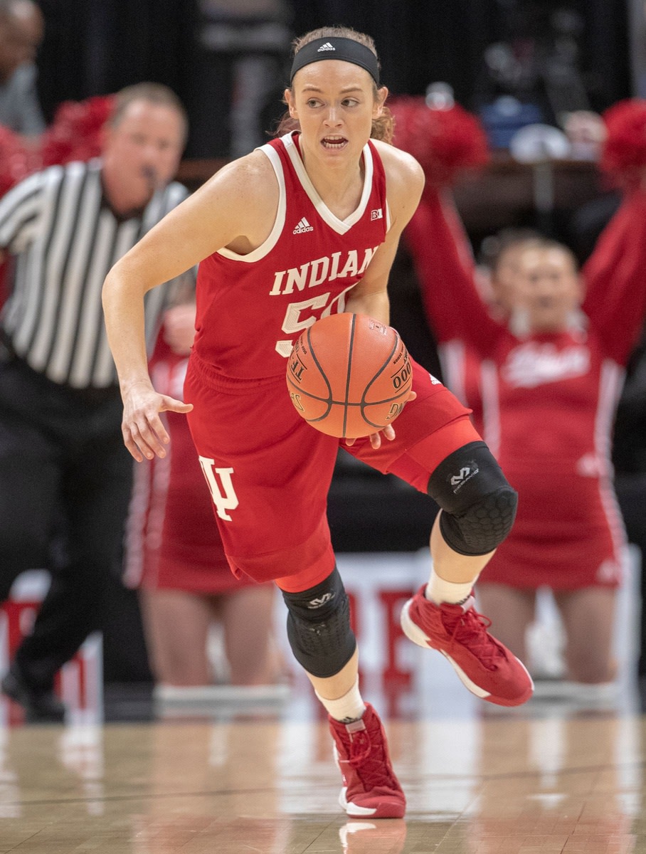 Brenna Wise of the Indiana Hoosiers scoops up a loose ball, Indiana vs. Iowa, Women's Big Ten Tournament, Bankers Life Fieldhouse, Indianapolis, Friday, March 8, 2019. Iowa won 70-61.