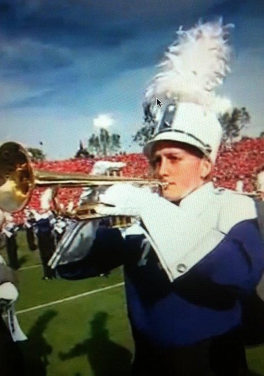 Tori (Cummings) Couch plays the trumpet at the 2011 Rose Bowl as a member of the TCU band. This was a screenshot from her brief appearance on ESPN.
