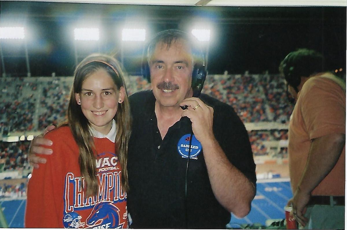 Tori (Cummings) Couch with the longtime "Voice of the Broncos", Paul J. Schneider, during a football game. Schneider called BSU football and basketball games for 35 years.