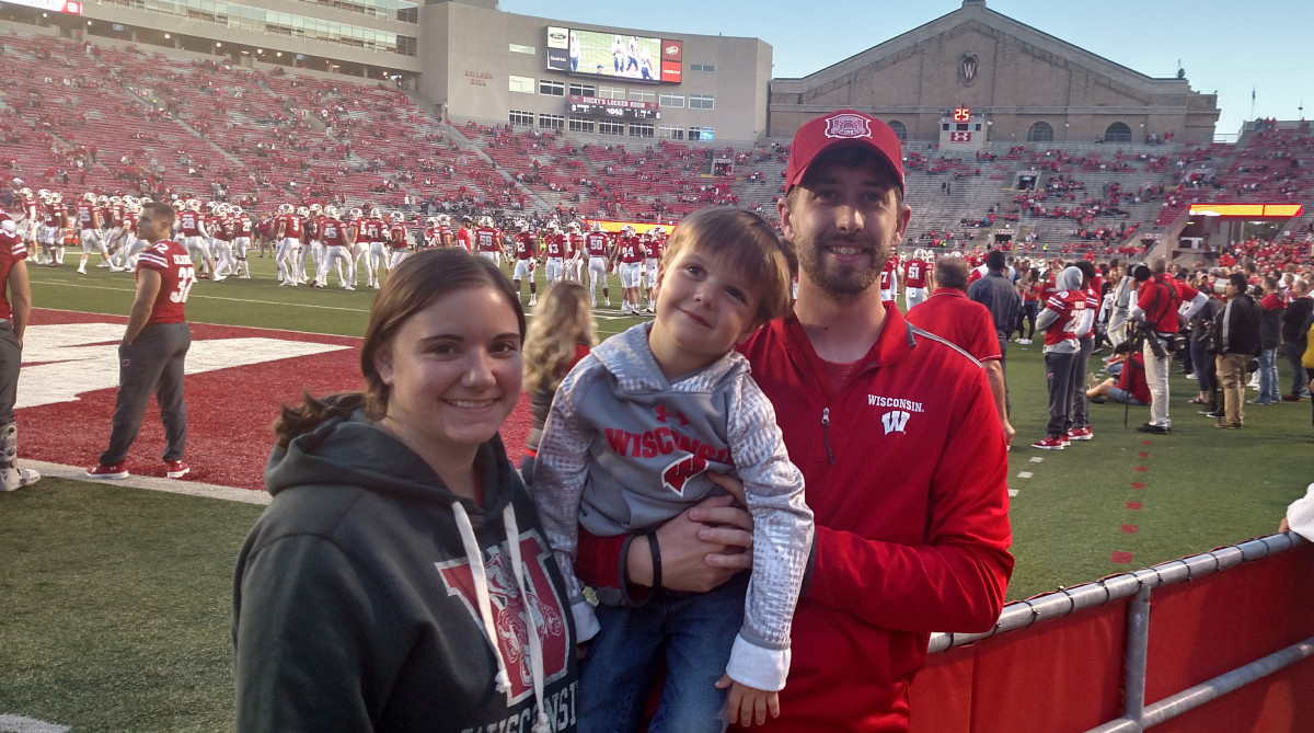 DeValk grew up as a diehard Badgers fan, but he and his wife (pictured here with their son) picked up Wake Forest as their local team to root for in North Carolina. 