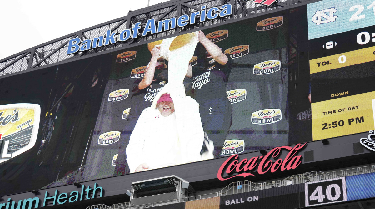 Duke’s Mayo Bowl chose two fans to help with the annual mayo dump