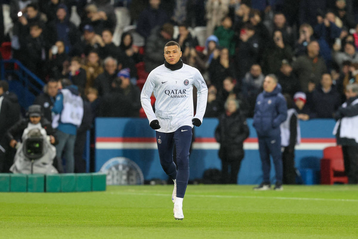 Kylian Mbappe pictured warming up ahead of PSG's game against Strasbourg in December 2022