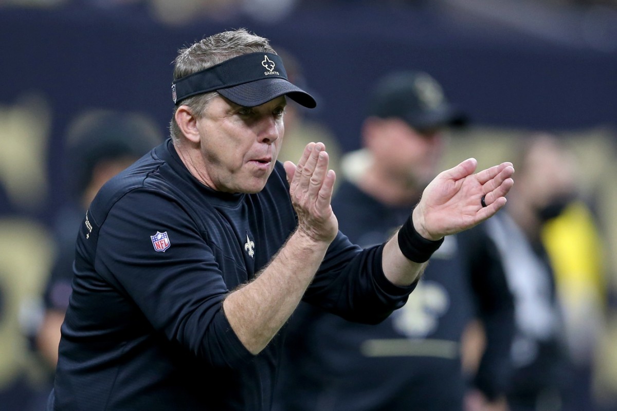 New Orleans Saints head coach Sean Payton claps during pregame warm ups before their game against the Carolina Panthers at the Caesars Superdome.