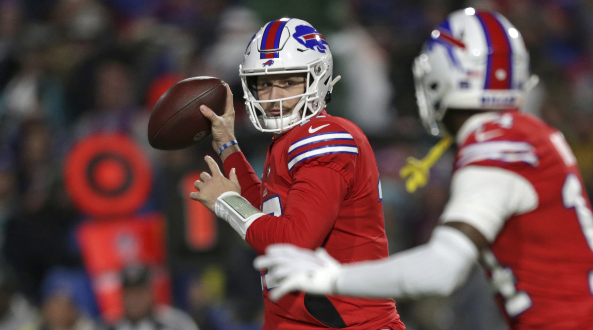 Bills QB Josh Allen looks to throw to WR Stefon Diggs.