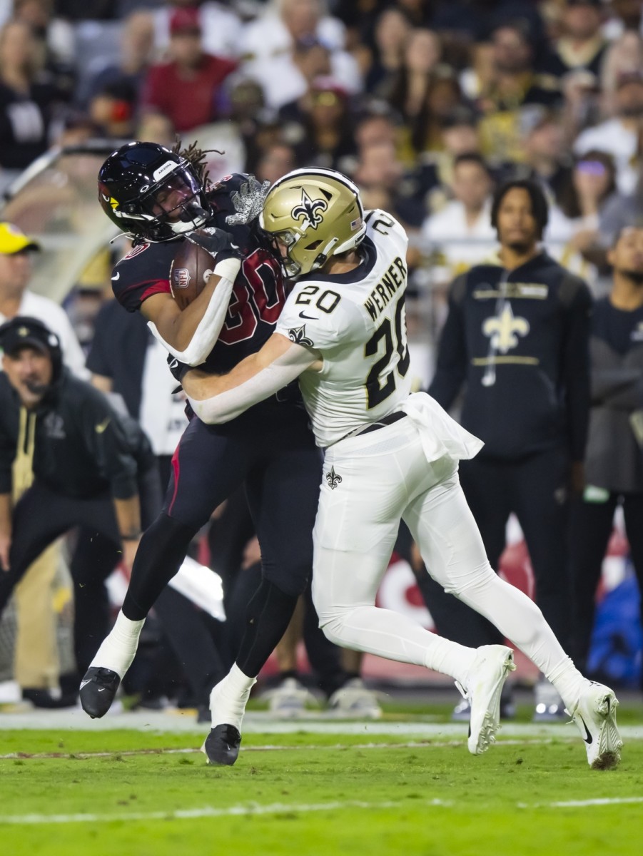 Oct 20, 2022; New Orleans Saints linebacker Pete Werner (20) tackles Arizona Cardinals running back Keaontay Ingram (30). Mandatory Credit: Mark J. Rebilas-USA TODAY Sports