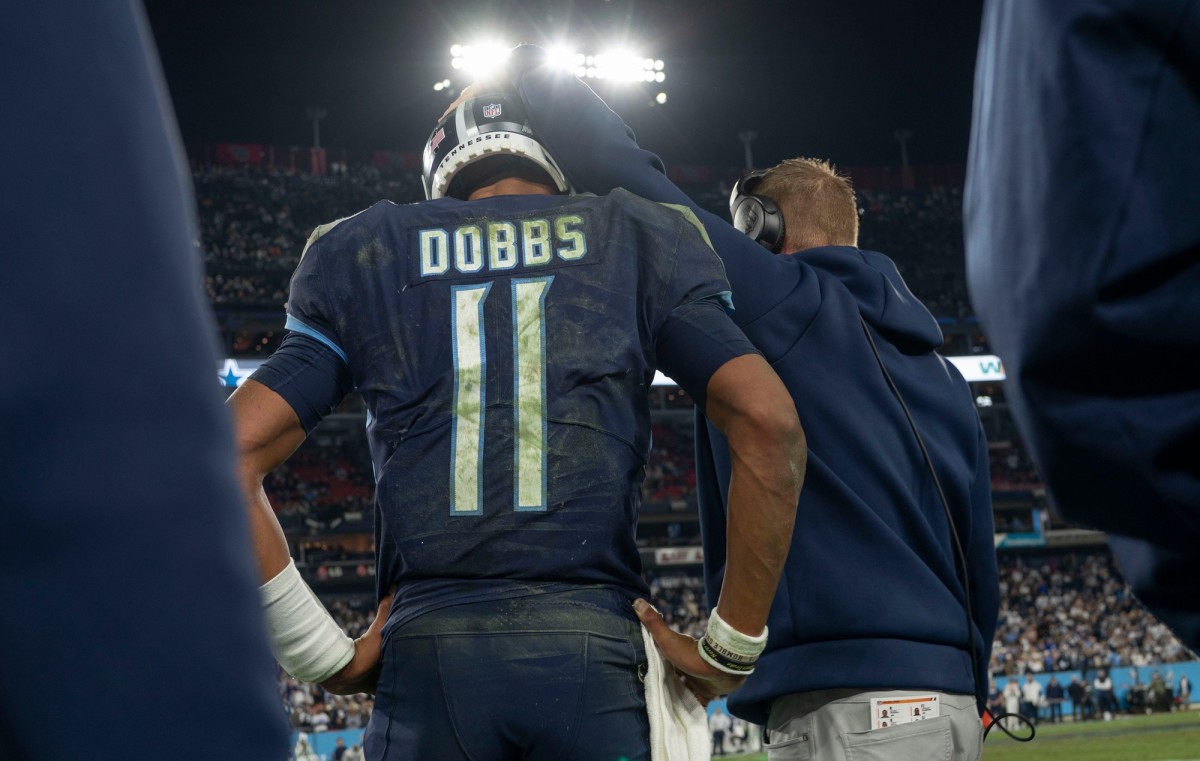 Tennessee Titans quarterback Joshua Dobbs (11) stands with offensive coordinator Todd Downing late in the fourth quarter at Nissan Stadium Thursday, Dec. 29, 2022, in Nashville, Tenn. The Cowboys defeated the Titans 27 to 13.