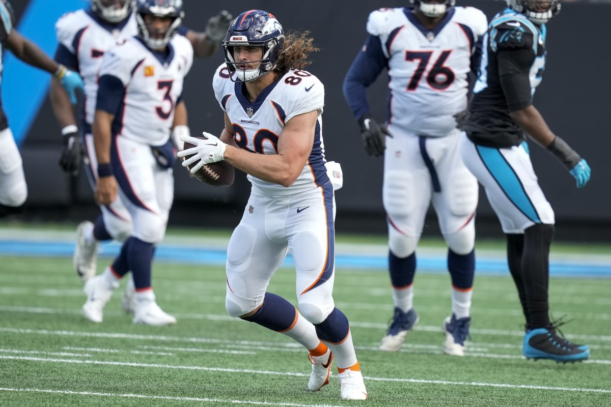 Denver Broncos tight end Greg Dulcich (80) runs for yards after catch against the Carolina Panthers during the second quarter at Bank of America Stadium.