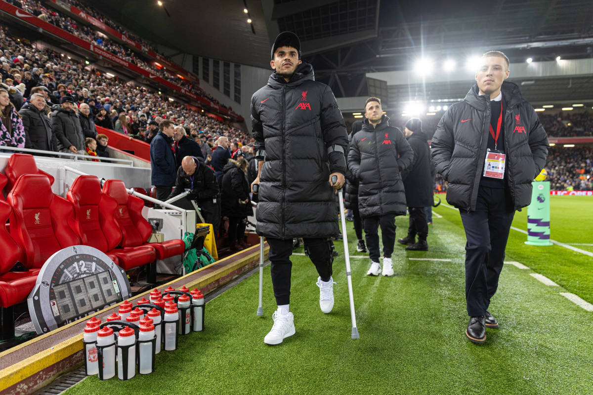 Luis Diaz pictured walking with crutches at Anfield in December 2022
