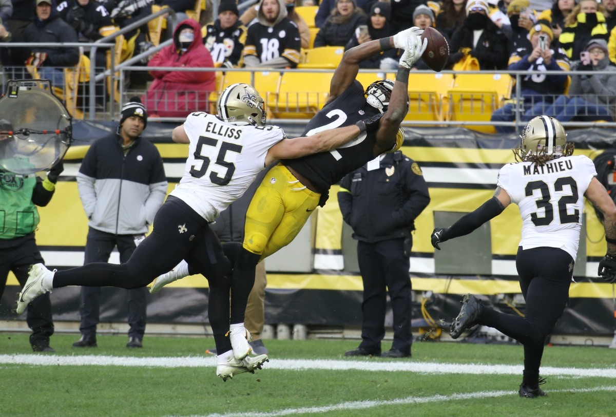 New Orleans Saints linebacker Kaden Elliss (55) defends a pass intended for Pittsburgh Steelers running back Najee Harris (22). Mandatory Credit: Charles LeClaire-USA TODAY Sports
