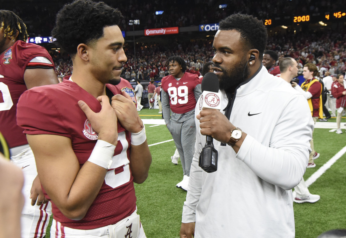 Alabama quarterback Bryce Young (9) is interviewed on the field by former Alabama player Mark Ingram after the 2022 Sugar Bowl at Caesars Superdome. Alabama defeated Kansas State 45-20. Both men are Heisman Trophy winners. Mandatory Credit: