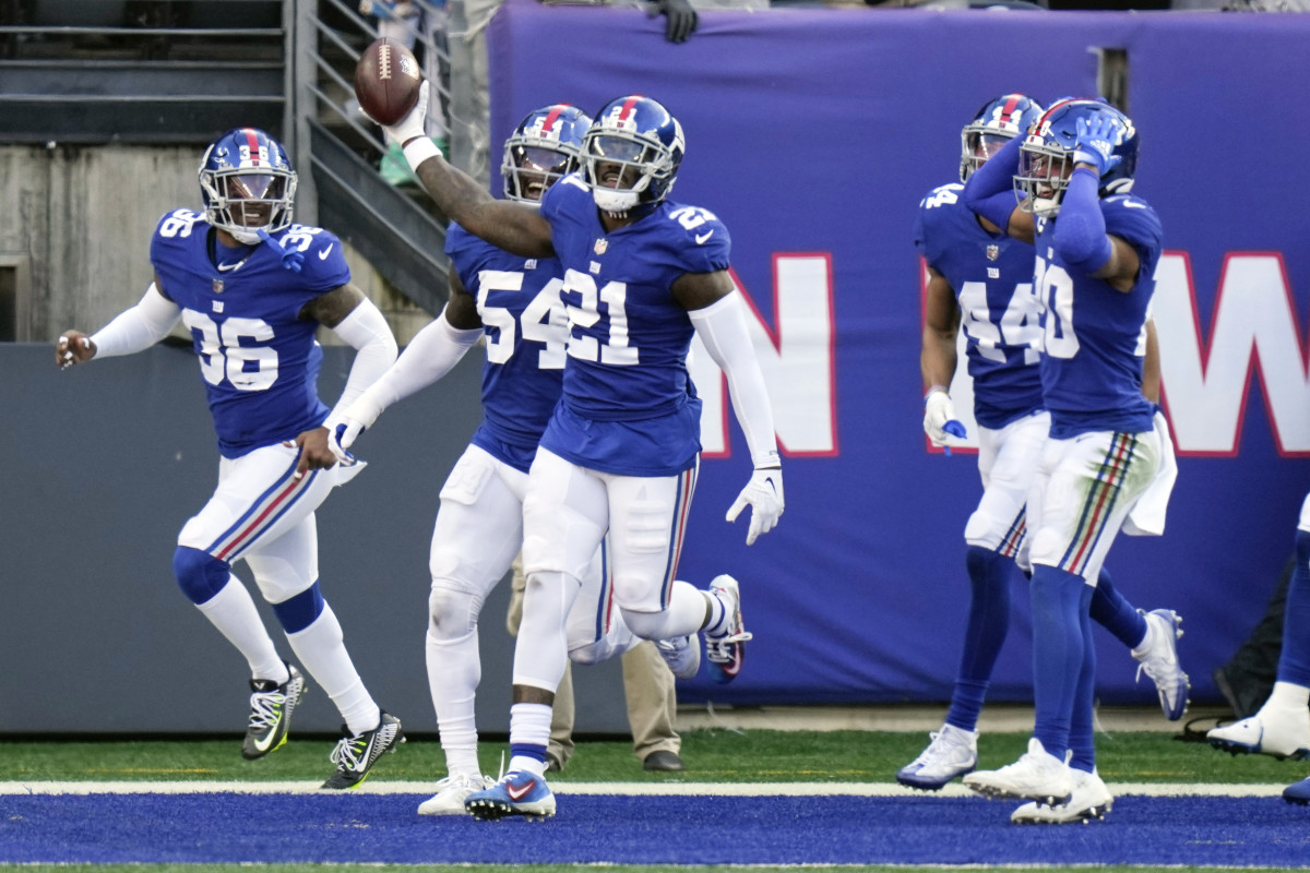 Landon Collins and teammates celebrate a pick-six against the Colts