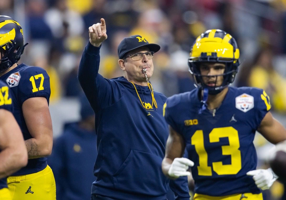 Michigan Wolverines head coach Jim Harbaugh against the TCU Horned Frogs in the 2022 Fiesta Bowl at State Farm Stadium.