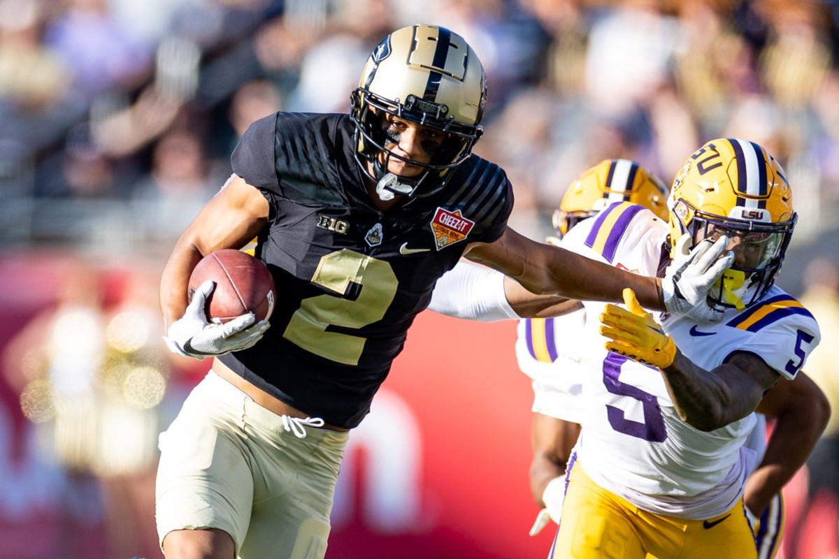 Purdue Boilermakers wide receiver Abdur-Rahmaan Yaseen (2) stiff arms LSU Tigers safety Jay Ward (5) during the second half at Camping World Stadium.