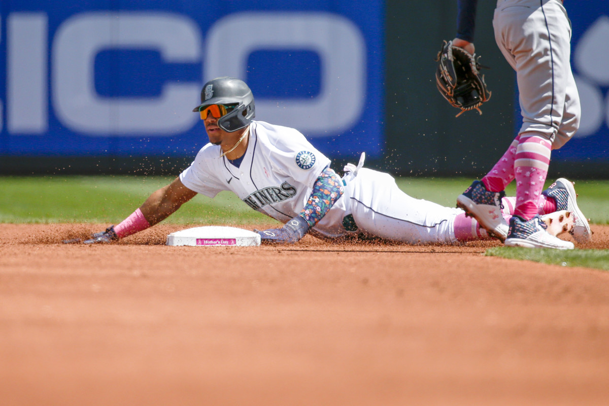 Mariners center fielder Julio Rodriguez steals second base against the Rays during the first inning at T-Mobile Park.