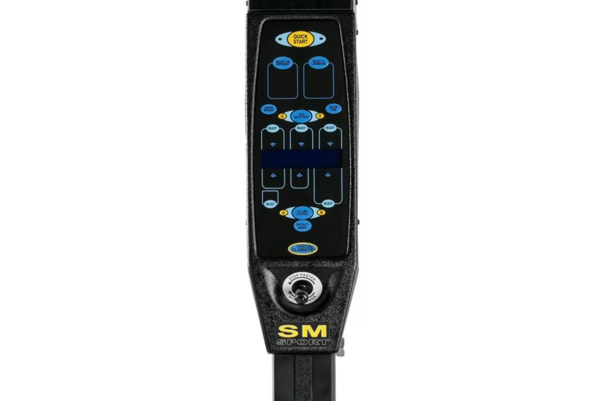 The control panel of the Versaclimber with blue and yellow buttons