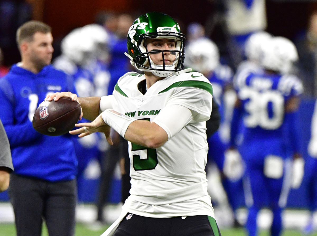 Nov 4, 2021; Indianapolis, Indiana, USA; New York Jets quarterback Mike White (5) warms up before the game against the Indianapolis Colts at Lucas Oil Stadium.