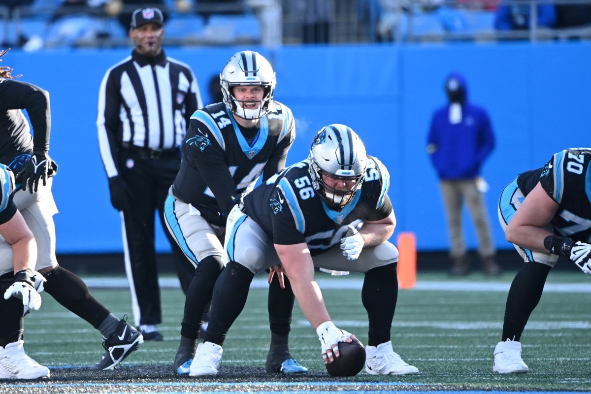 Carolina Panthers center Bradley Bozeman (56) gets ready to hike the ball to quarterback Sam Darnold (14) in the third quarter at Bank of America Stadium.