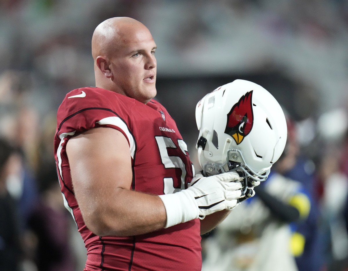 Arizona Cardinals center Billy Price (53) prepares for pre-game warm ups before playing against the New England Patriots at State Farm Stadium.