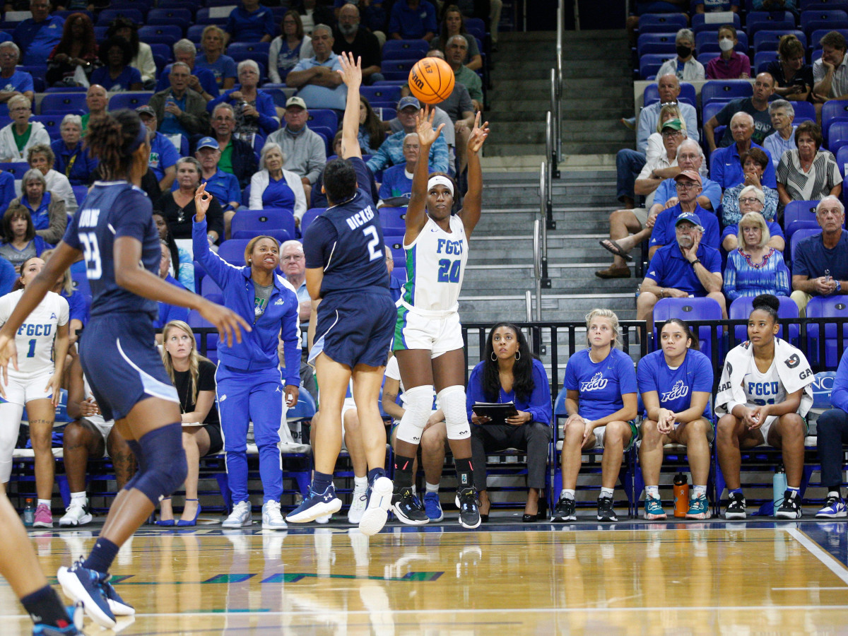 Sha Carter shoots a three-pointer for FGCU in a game against Old Dominion.