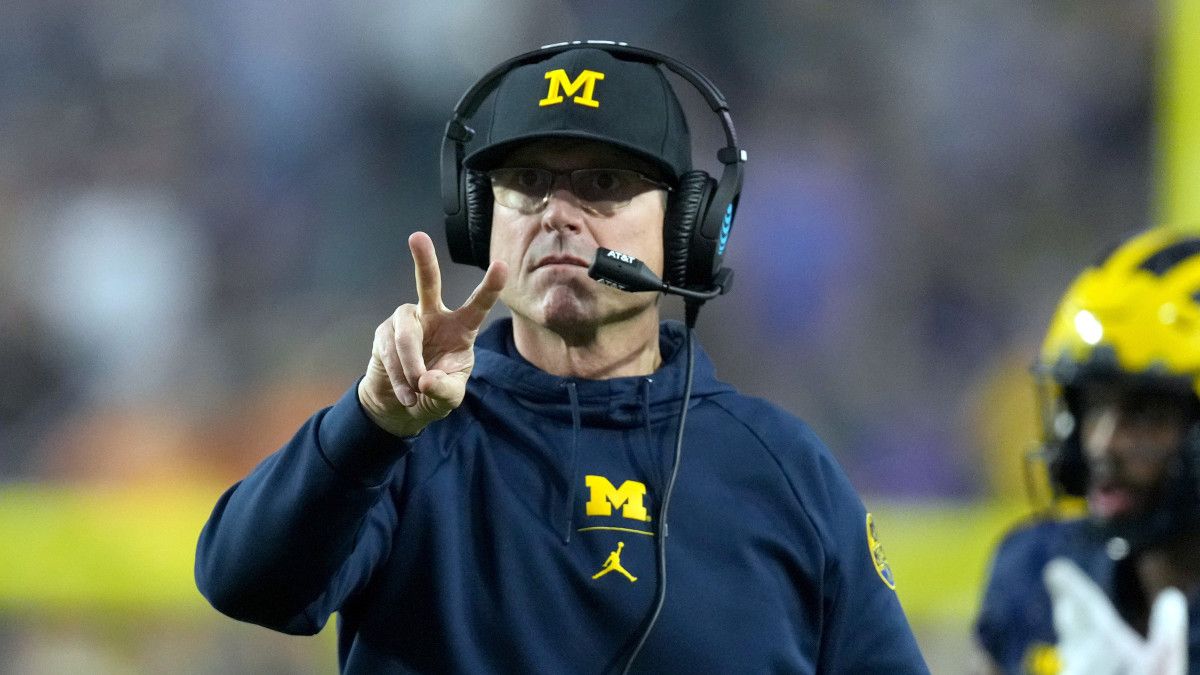 Jim Harbaugh 2 Sign Michigan Kirby Lee-USA TODAY Sports