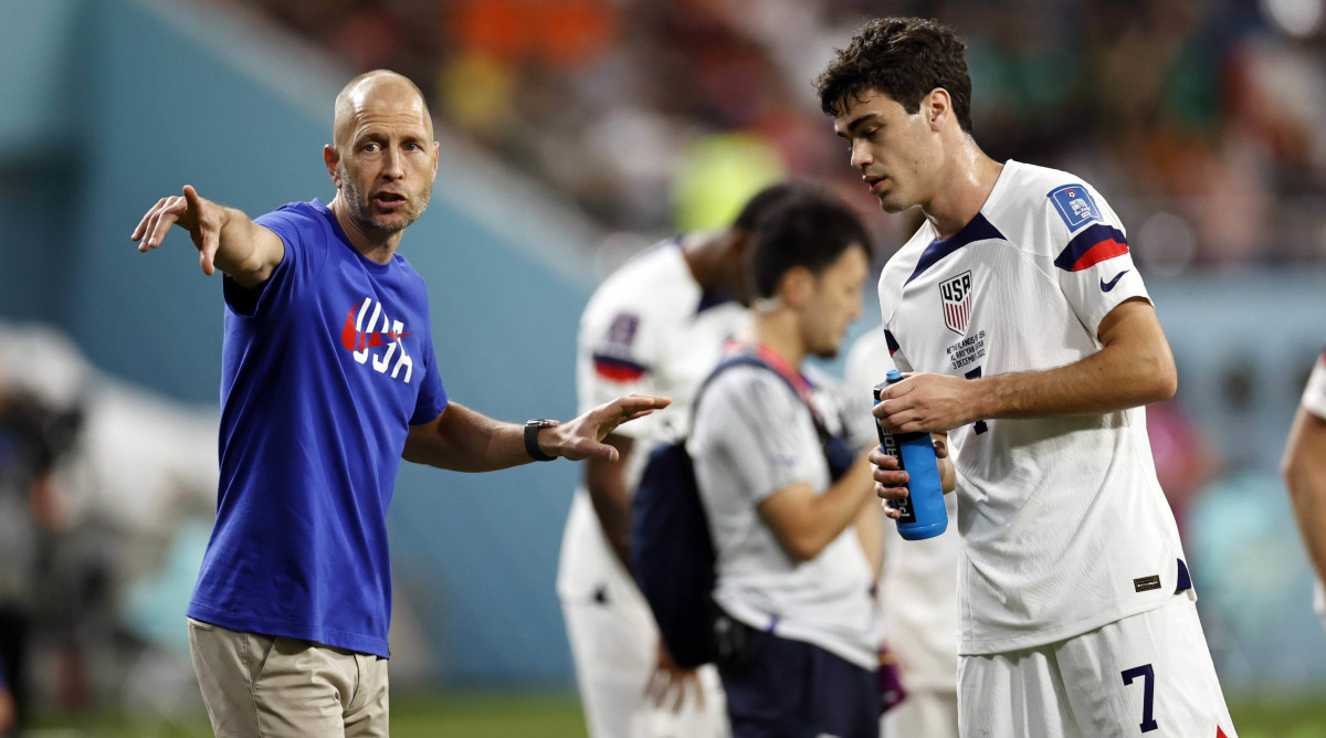 Gregg Berhalter and Gio Reyna at the World Cup.