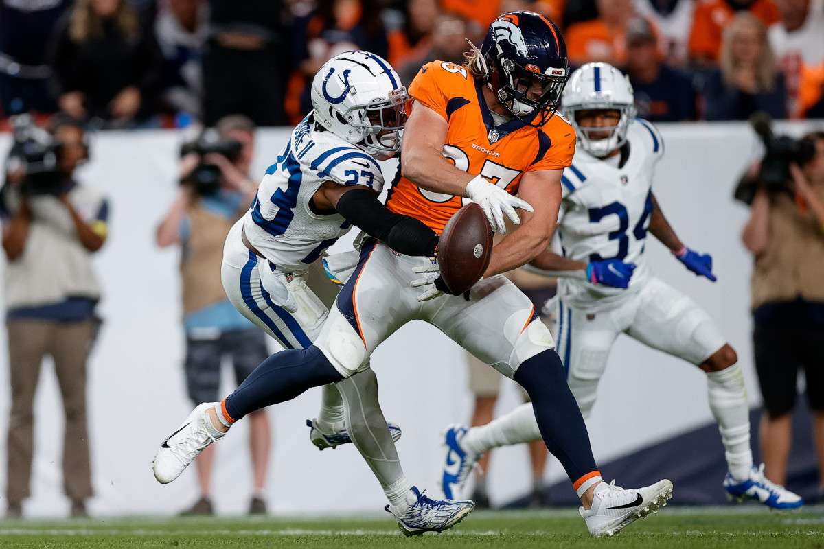 Oct 6, 2022; Denver, Colorado, USA; Indianapolis Colts cornerback Kenny Moore II (23) breaks up a pass intended for Denver Broncos tight end Andrew Beck (83) in the third quarter at Empower Field at Mile High.
