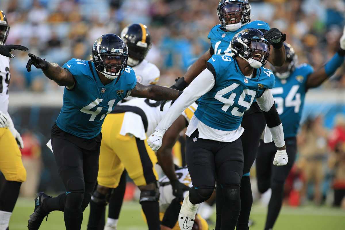 Jacksonville Jaguars defensive end Arden Key #49 reacts to recording a sack as teammates linebacker Josh Allen #41 and linebacker Travon Walker #44 celebrate too during the first quarter of an NFL preseason game Saturday, Aug. 20, 2022 at TIAA Bank Field in Jacksonville.