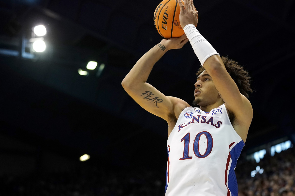 Kansas forward Jalen Wilson shoots during the first half of an NCAA college basketball game against Oklahoma State Saturday, Dec. 31, 2022, in Lawrence, Kan. (AP Photo/Charlie Riedel)