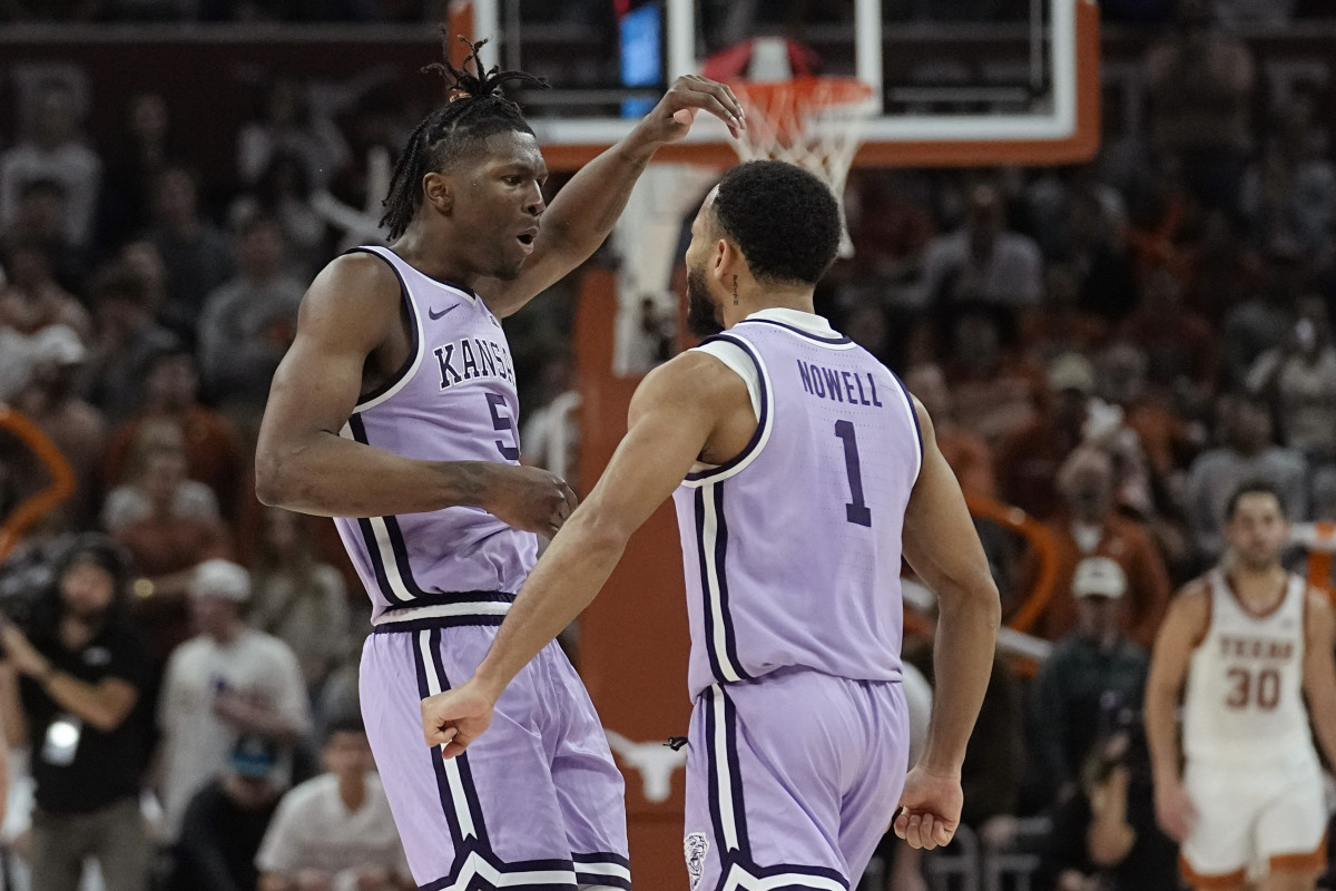 Kansas State guard Cam Carter (5) and guard Markquis Nowell (1) celebrate a score against Texas during the second half of an NCAA college basketball game in Austin, Texas, Tuesday, Jan. 3, 2023. (AP Photo/Eric Gay)