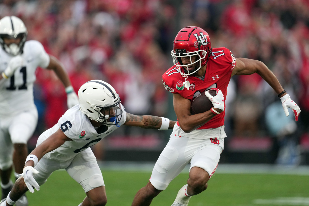 Utah Utes wide receiver Devaughn Vele (17) runs against Penn State Nittany Lions safety Zakee Wheatley (6) in the first half of the 109th Rose Bowl game at the Rose Bowl.