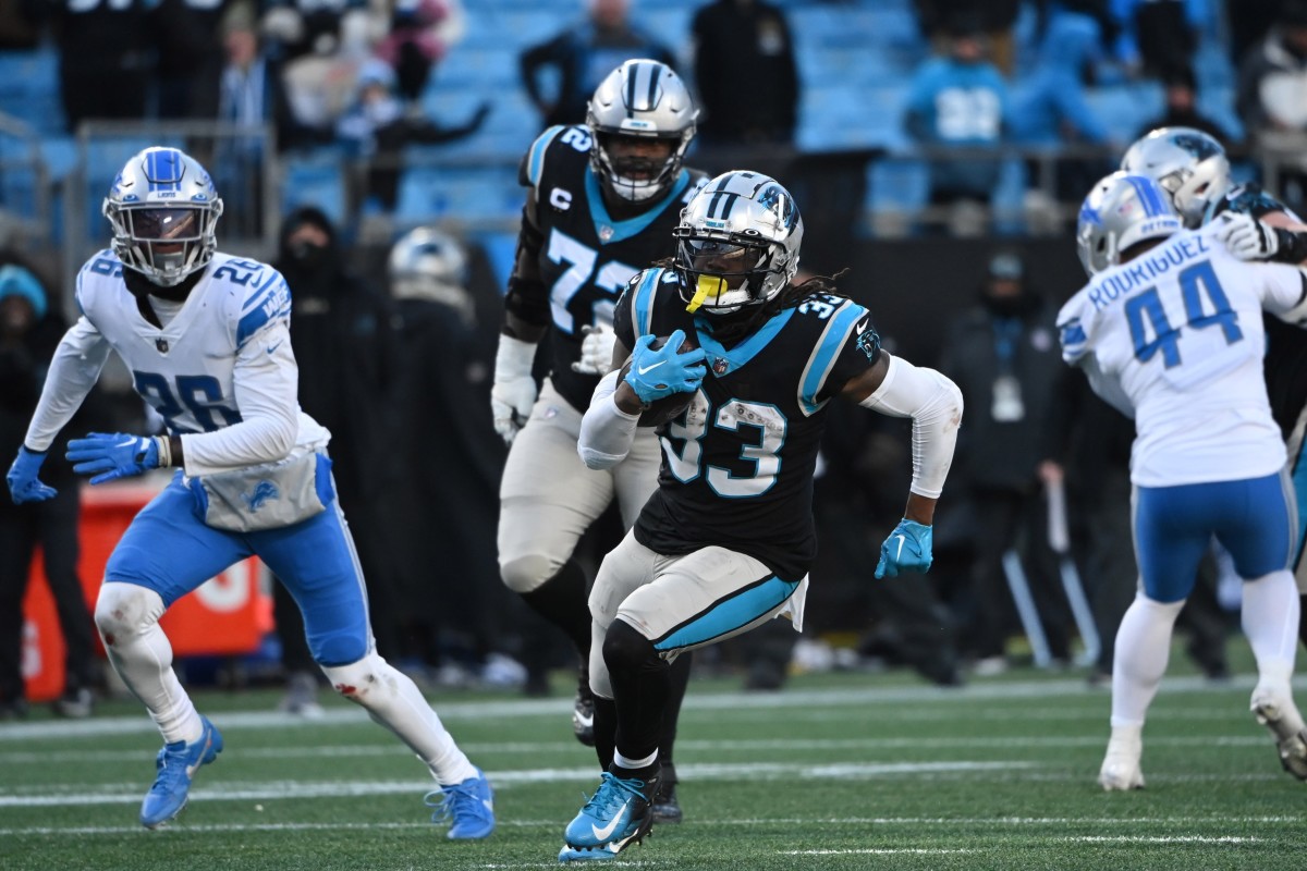 Carolina Panthers running back D'Onta Foreman (33) runs the ball through the Detroit Lions defense. Mandatory Credit: Bob Donnan-USA TODAY Sports