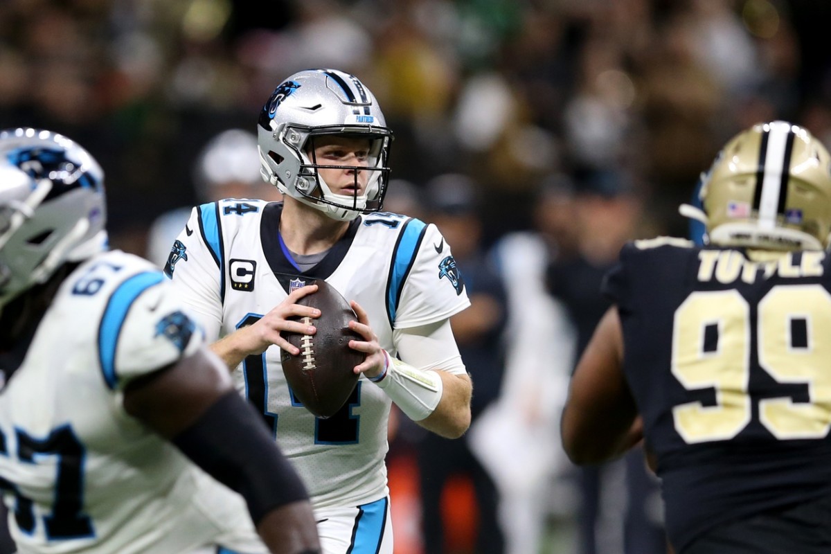 Jan 2, 2022; Carolina Panthers quarterback Sam Darnold (14) looks to throw against the New Orleans Saints. Mandatory Credit: Chuck Cook-USA TODAY Sports