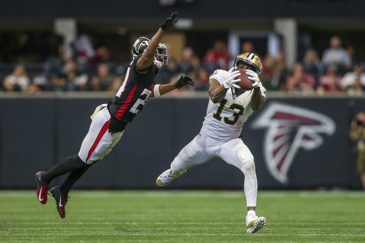 Sep 11, 2022; New Orleans Saints wide receiver Michael Thomas (13) catches a pass over Atlanta Falcons cornerback A.J. Terrell (24). Mandatory Credit: Brett Davis-USA TODAY Sports