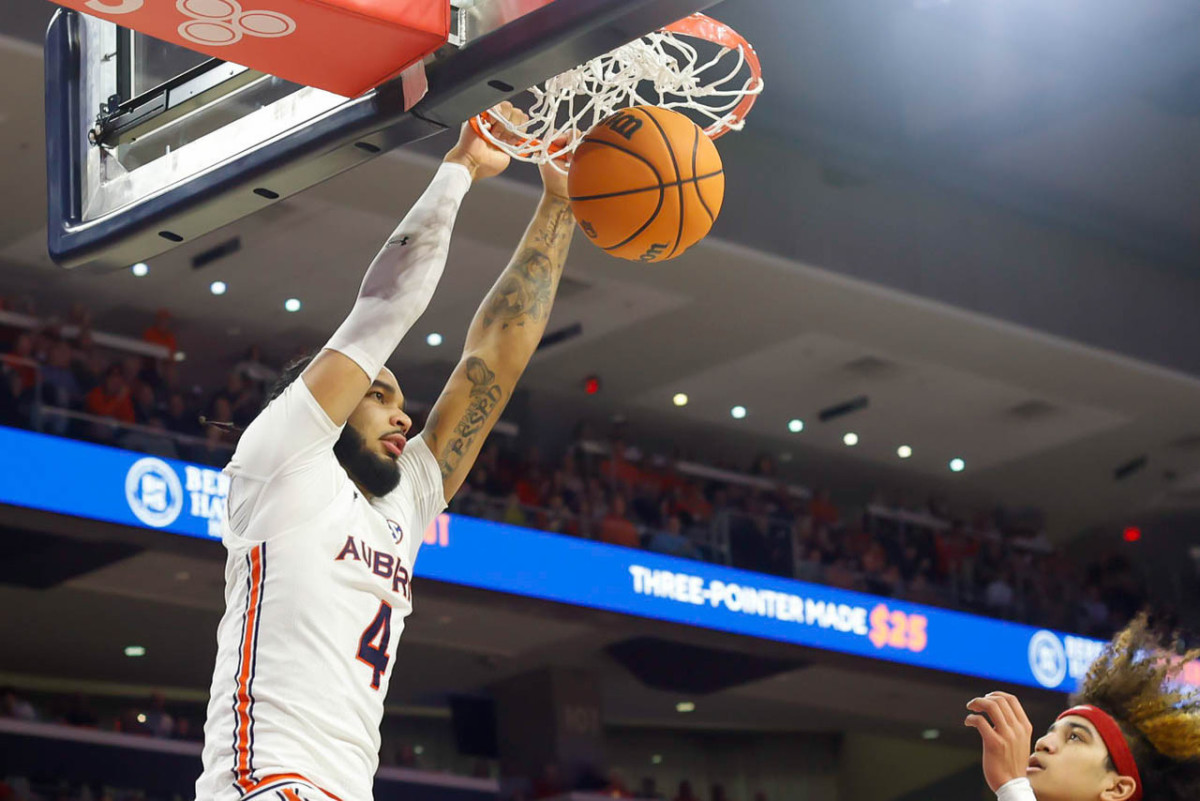 WATCH Johni Broome opens vs Kentucky with a three Sports Illustrated