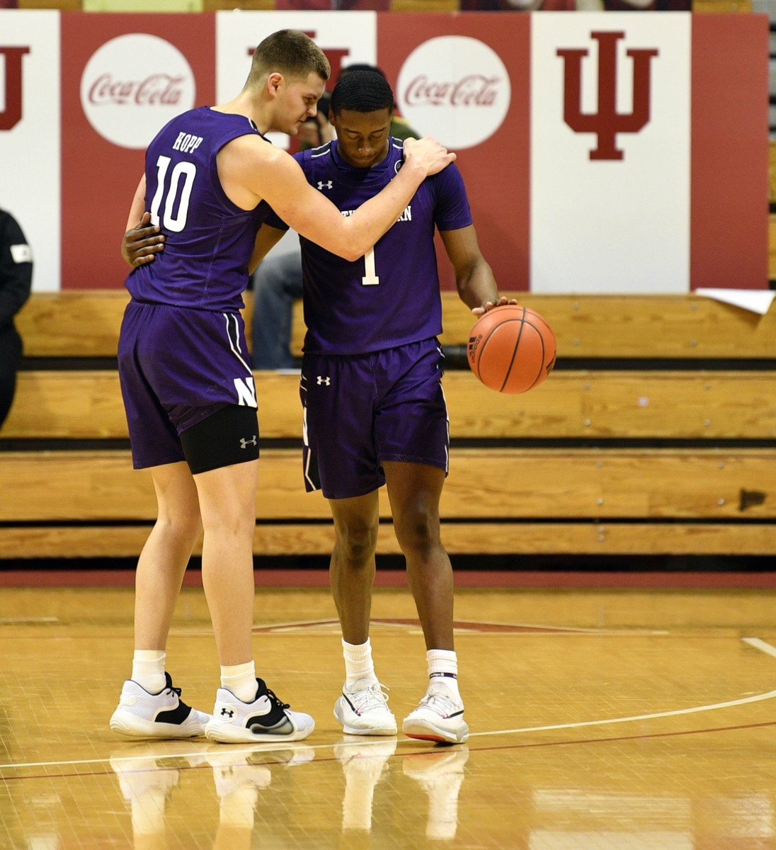 Northwestern guard Chase Audige talks to Miller Kopp during a game at Assembly Hall in December of 2020. Kopp transferred to Indiana last year and will play against his former team for the third time on Sunday. (Mark Lebryk/USA TODAY Sports)