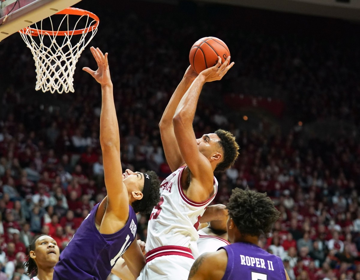 Indiana Hoosiers forward Trayce Jackson-Davis (23) scores over Northwestern Wildcats forward Tydus Verhoeven (10) during the first half at Simon Skjodt Assembly Hall.