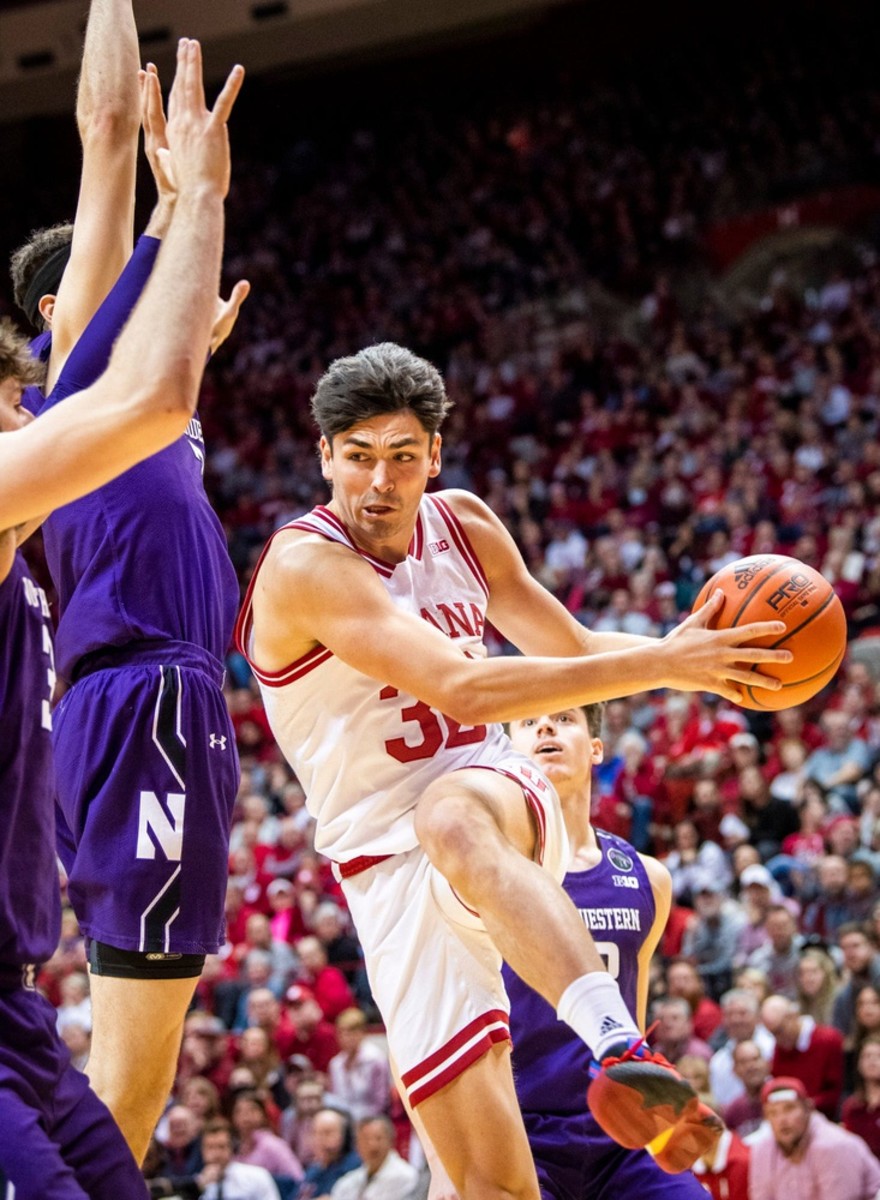 Indiana's Trey Galloway (32) passes out from a double team during the first half ot the Indiana versus Northwestern men's basketball game at Simon Skjodt Assembly Hall.