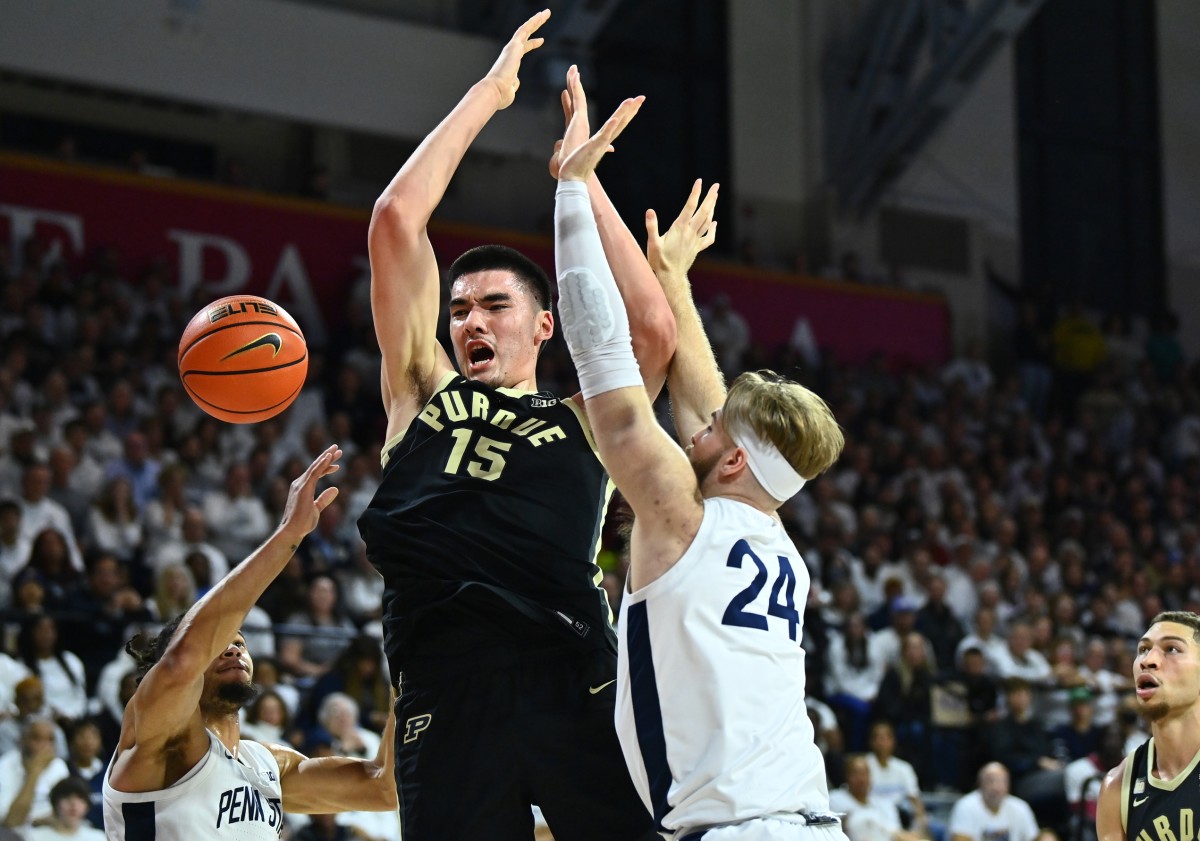 Jan 8, 2023; Philadelphia, Pennsylvania, USA; Purdue Boilermakers center Zach Edey (15) loses control of the ball against Penn State Nittany Lions forward Michael Henn (24) in the first half at The Palestra.