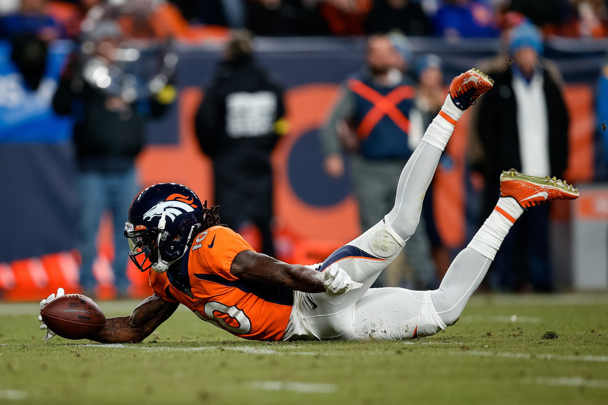 Jan 8, 2023; Denver, Colorado, USA; Denver Broncos wide receiver Jerry Jeudy (10) dives to recover a fumble in the fourth quarter against the Los Angeles Chargers at Empower Field at Mile High. Mandatory Credit: Isaiah J. Downing-USA TODAY Sports