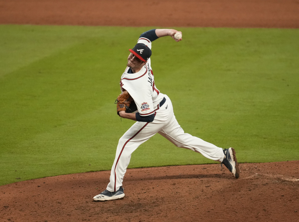 Atlanta Braves relief pitcher Luke Jackson (77) throws against the Houston Astros during the eighth inning of game four of the 2021 World Series.
