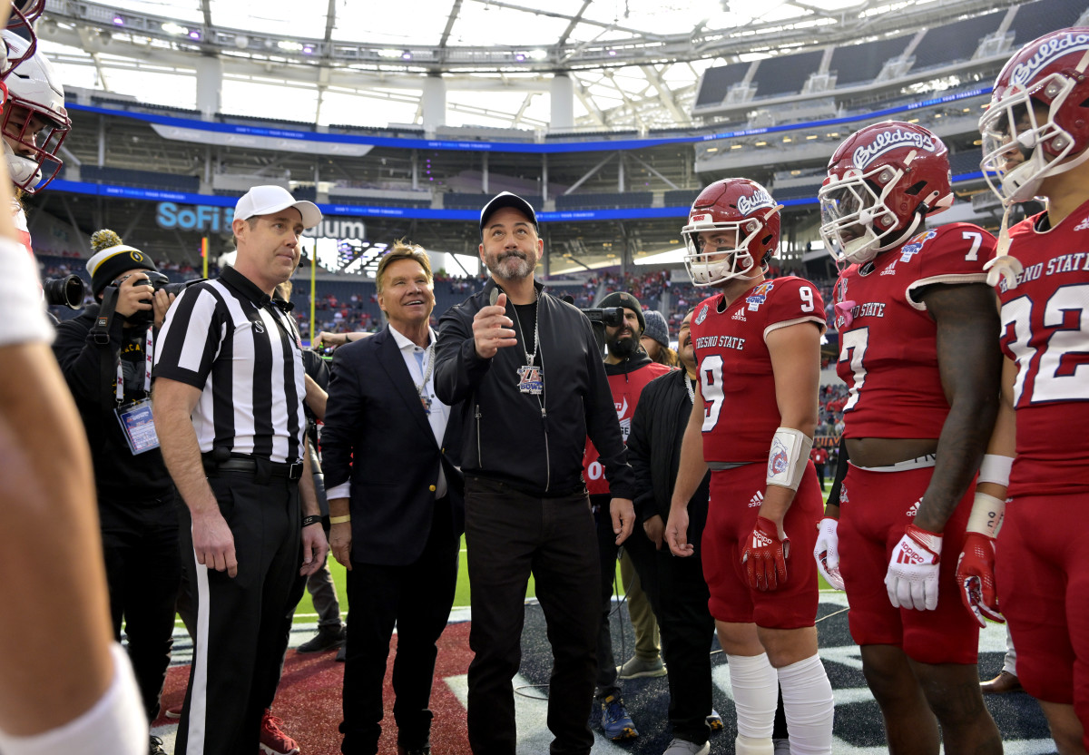 Jimmy Kimmel throws the coin toss to start the LA Bowl game between the Washington State Cougars and the Fresno State Bulldogs at SoFi Stadium.