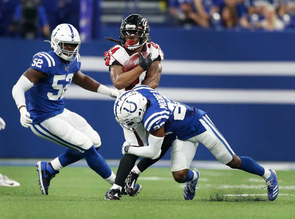 Indianapolis Colts cornerback Kenny Moore (23) hits Atlanta Falcons running back Devonta Freeman (24) in the second half of their game against the Atlanta Falcons at Lucas Oil Stadium on Sunday, Sept. 22., 2019. The Indianapolis Colts defeated the Atlanta Falcons 27-24. Indianapolis Colts Host Atlanta Falcons In Home Opener