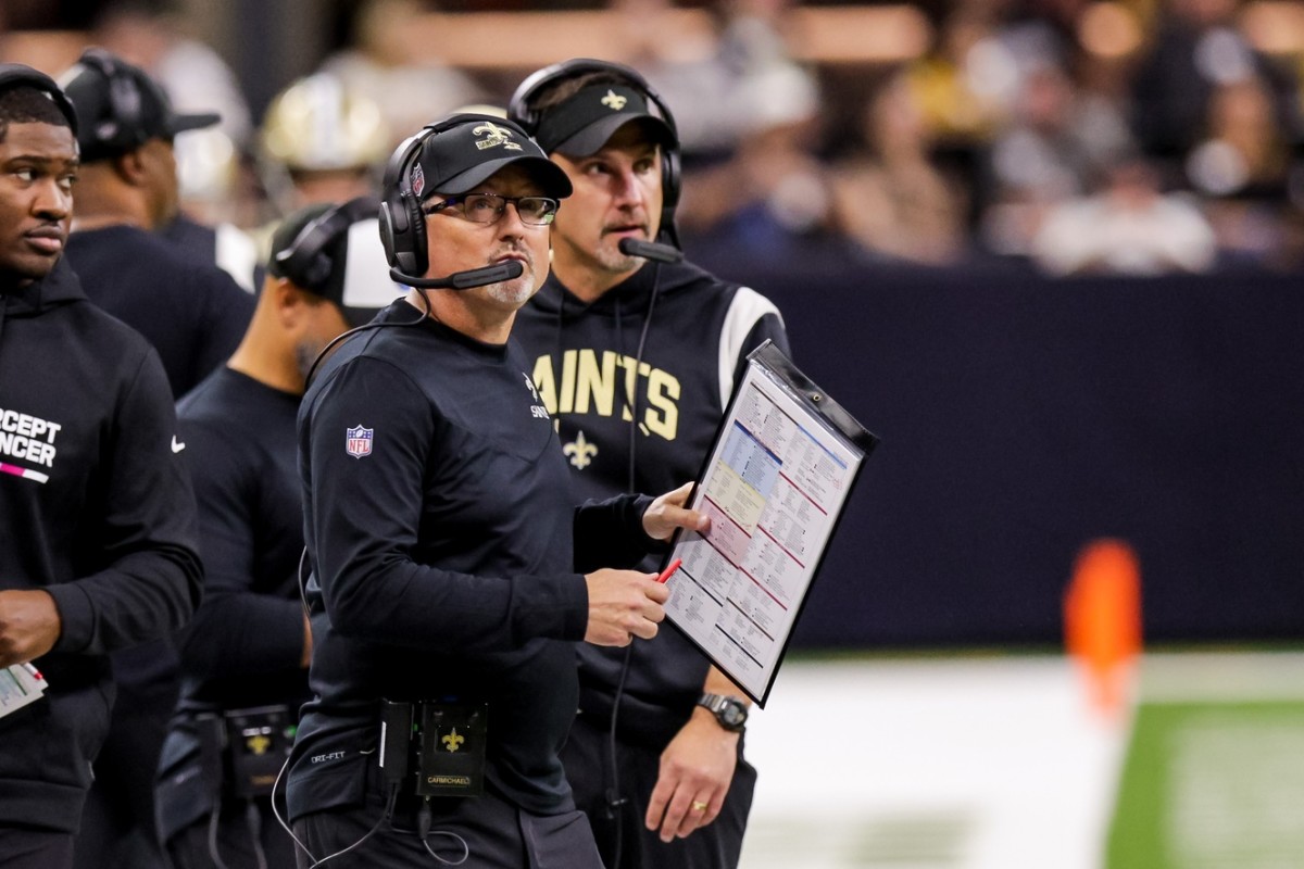 New Orleans Saints offensive coordinator Pete Carmichael (left) looks on with head coach Dennis Allen (right). Mandatory Credit: Stephen Lew-USA TODAY